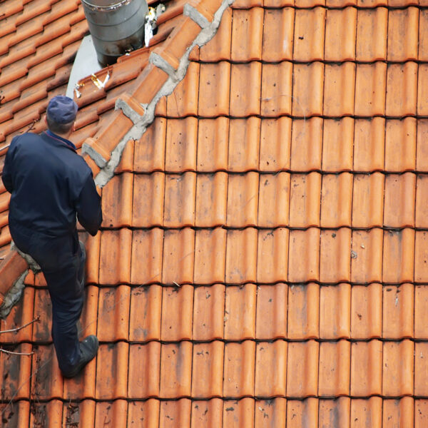 Roofer Doing Roof Maintenance